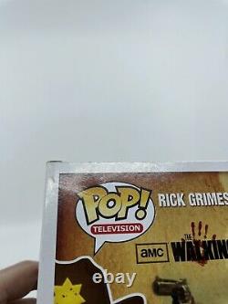 Funko Pop! The Walking Dead Rick Grimes #13 Bloody Harrison's Exclusive with Stack