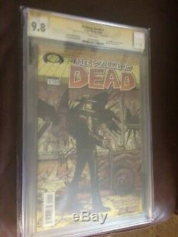 The Walking Dead issue #1 CGC SS 9.8 first printing. Signed by Moore and kirkman