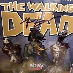 Walking Dead #15 CGC 9.8 Signed by Kirkman 1st app Michonne