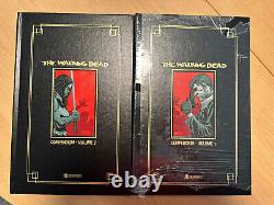 Décacheté. Le compendium en papier doré 1 et 2 de The Walking Dead en italien.