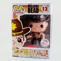 Funko Pop The Walking Dead Bloody Rick Grimes Harrison's Comics Exclusive #13 <br/>  <br/>   Funko Pop Le Walking Dead Bloody Rick Grimes Harrison's Comics Exclusive #13