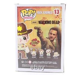 Funko Pop The Walking Dead Bloody Rick Grimes Harrison's Comics Exclusive #13			<br/>	  		 
<br/>
Funko Pop Le Walking Dead Bloody Rick Grimes Harrison's Comics Exclusive #13