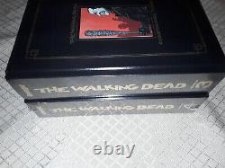 Le Compendium 3 et 4 de The Walking Dead, reliure rigide, dorure en feuille d'or, neuf.
