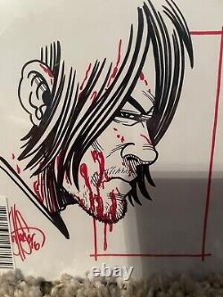 Le Walking Dead numéro 150, remarqué avec une couverture de croquis de Daryl et signé par l'artiste.