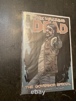 Le lot de bandes dessinées de The Walking Dead, numéros 96 à 139, incluant les numéros sur Michonne et le Gouverneur, d'occasion.