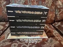 Les compendiums de The Walking Dead Vols 1-4 ainsi que L'Art de l'univers de The Walking Dead