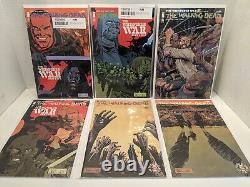 Lot 57 Walking Dead Comics #1100, 117-118,129-133,141-146,148-150,155-160,162+