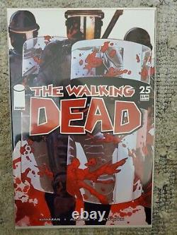 Lot de bandes dessinées de 26 numéros de The Walking Dead, numéros rares et clés