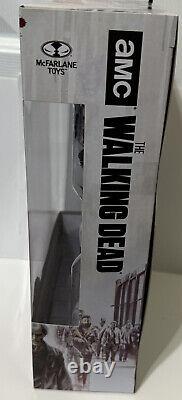 The French translation of this title is: 'Walking Dead TV Daryl, Rick et Jesus DLX Ensemble de figurines d'action Alliés! McFarlane'