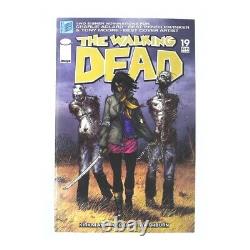 The French translation of this title would be: 'Walking Dead (série de 2003) #19 en condition Near Mint minus. Image comics w&'