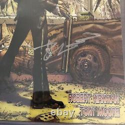 The Walking Dead #1 1ère édition signée par Robert Kirkman CGC 8.0 pages blanches.