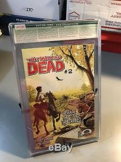 The Walking Dead # 1 Cgc 9,8 Nm / M Autographié Par Robert Kirkman