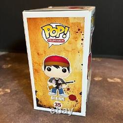 The Walking Dead Glen Steven Yeun 35 Funko Pop Autograph Signed translates to French as: 'The Walking Dead Glen Steven Yeun 35 Funko Pop Autographe Signé'
