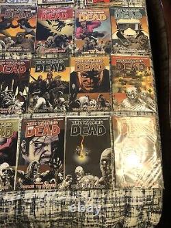 The Walking Dead Vol 1 30 Ensemble complet Lot Image Comics Kirkman TPB Bonus Book<br/>
  
 

<br/>(Note: 'comics' is typically not translated in French, as it is understood as the term for comic books in general)