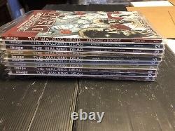 The Walking Dead Vol 1 30 Ensemble complet Lot Image Comics Kirkman TPB Bonus Book	<br/>    	<br/>
	 	(Note: 'comics' is typically not translated in French, as it is understood as the term for comic books in general)