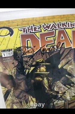 The translated title in French would be: Walking Dead #1 Cgc 9.8 Image 2003 Signé par Kirkman & Moore Super Esquisse