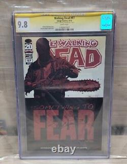 The translation in French: The Walking Dead #97, 1ère édition CGC 9.8 Robert Kirkman / Autographe, 2013-1182601007